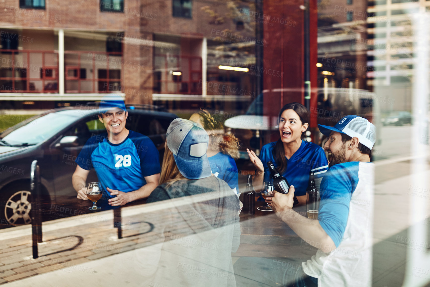 Buy stock photo Friends, sports and people with drinking in pub for watching football match, social gathering and happy hour. Soccer fans, group and beer at restaurant for event support, relax and game conversation