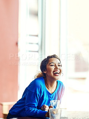 Buy stock photo Cropped shot of a young woman enjoying herself in a pub