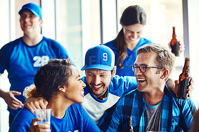 Buy stock photo A group of excited friends cheering on their favourite team at the bar