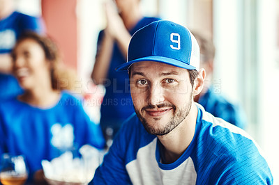 Buy stock photo Portrait of a man watching a sports game with friends at a bar