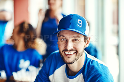 Buy stock photo Portrait of a man watching a sports game with friends at a bar