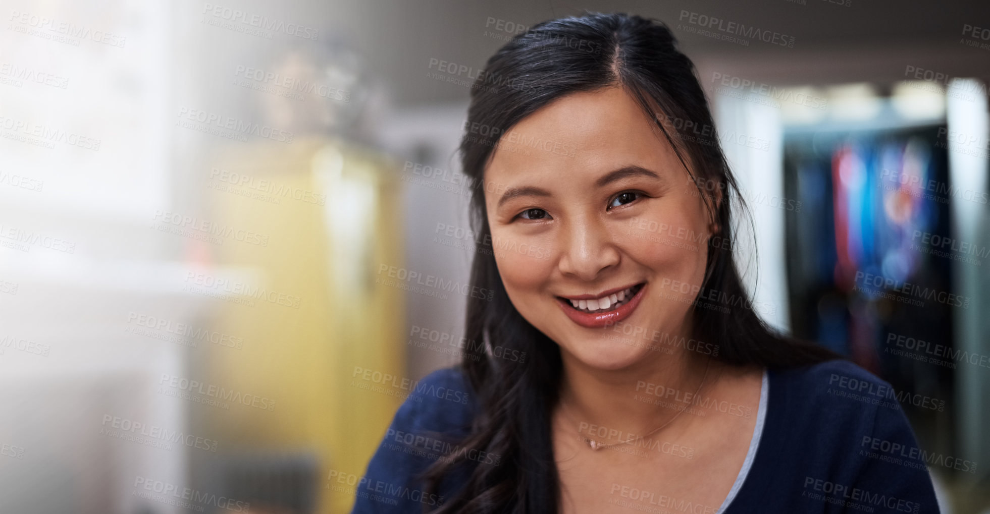 Buy stock photo Cropped portrait of an attractive young female entrepreneur working from home