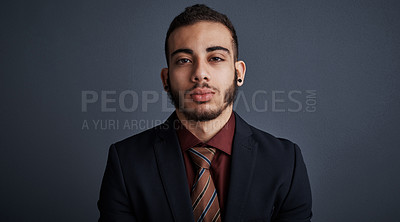 Buy stock photo Studio portrait of a stylish young businessman against a gray background