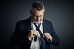 Putting a tie around that white collar