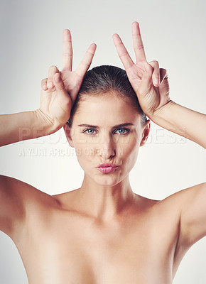 Buy stock photo Skincare, peace sign and portrait of woman in studio for natural treatment, dermatology or wellness with white background. Hand gesture, kiss and female model for beauty, glowing skin or shine
