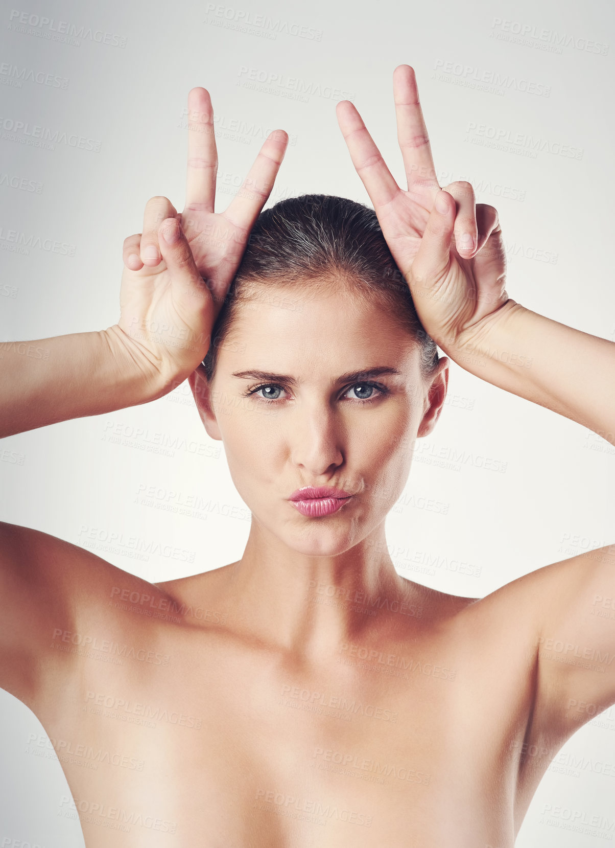 Buy stock photo Skincare, peace sign and portrait of woman in studio for natural treatment, dermatology or wellness with white background. Hand gesture, kiss and female model for beauty, glowing skin or shine