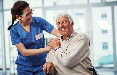 Buy stock photo Cropped shot of a young female nurse and her senior patient in the old age home