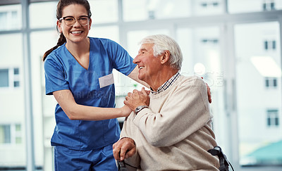 Buy stock photo Cropped shot of a young female nurse and her senior patient in the old age home