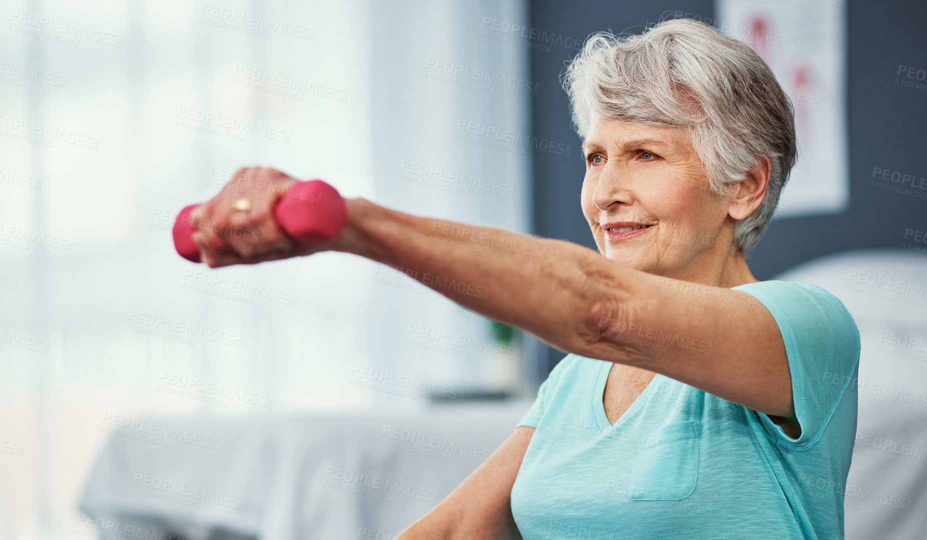 Buy stock photo Cropped shot of a senior woman working out with dumbbells