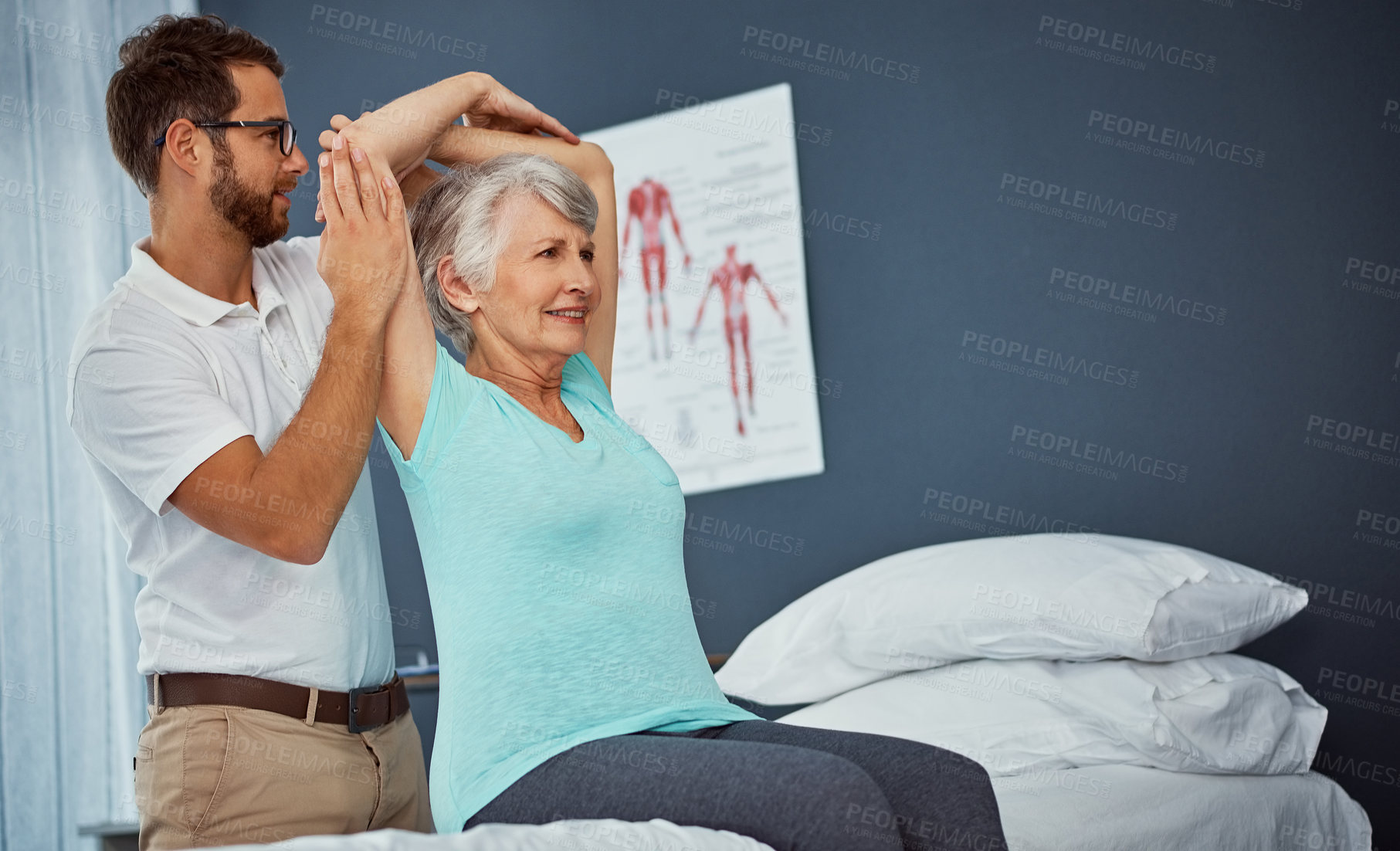 Buy stock photo Cropped shot of a senior woman working through her recovery with a male physiotherapist