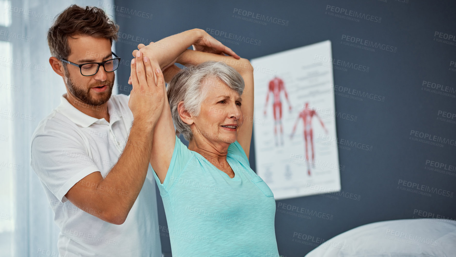 Buy stock photo Cropped shot of a senior woman working through her recovery with a male physiotherapist