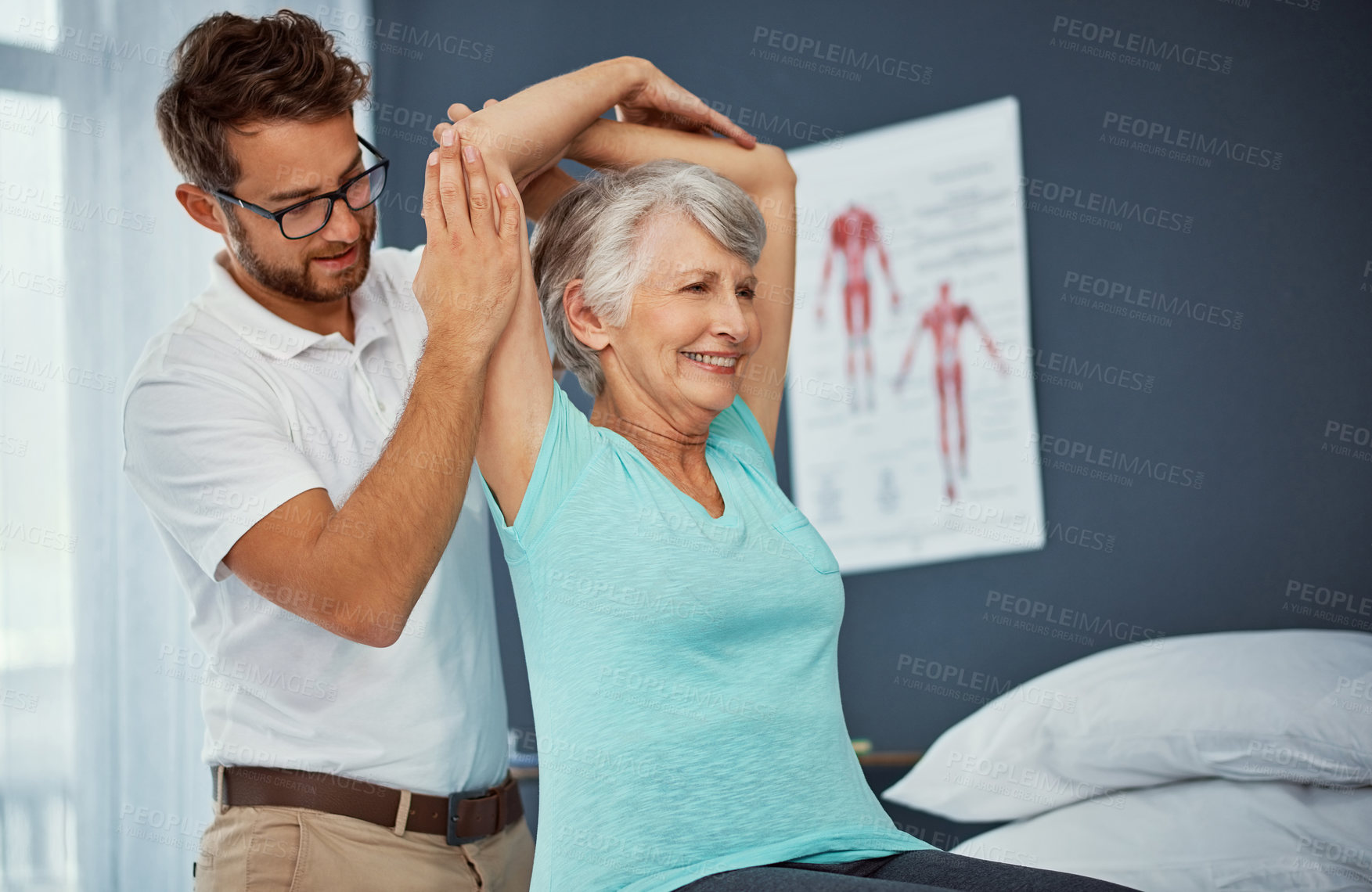 Buy stock photo Cropped shot of a senior woman working through her recovery with a male physiotherapist