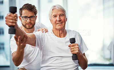 Buy stock photo Cropped portrait of a senior man working on his recovery with a male physiotherapist