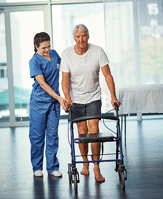 Buy stock photo Physiotherapy, old man and walker with woman, help and rehabilitation in hospital. Caretaker, nurse and portrait of elderly patient with a disability, smile and healthcare for mobility in clinic