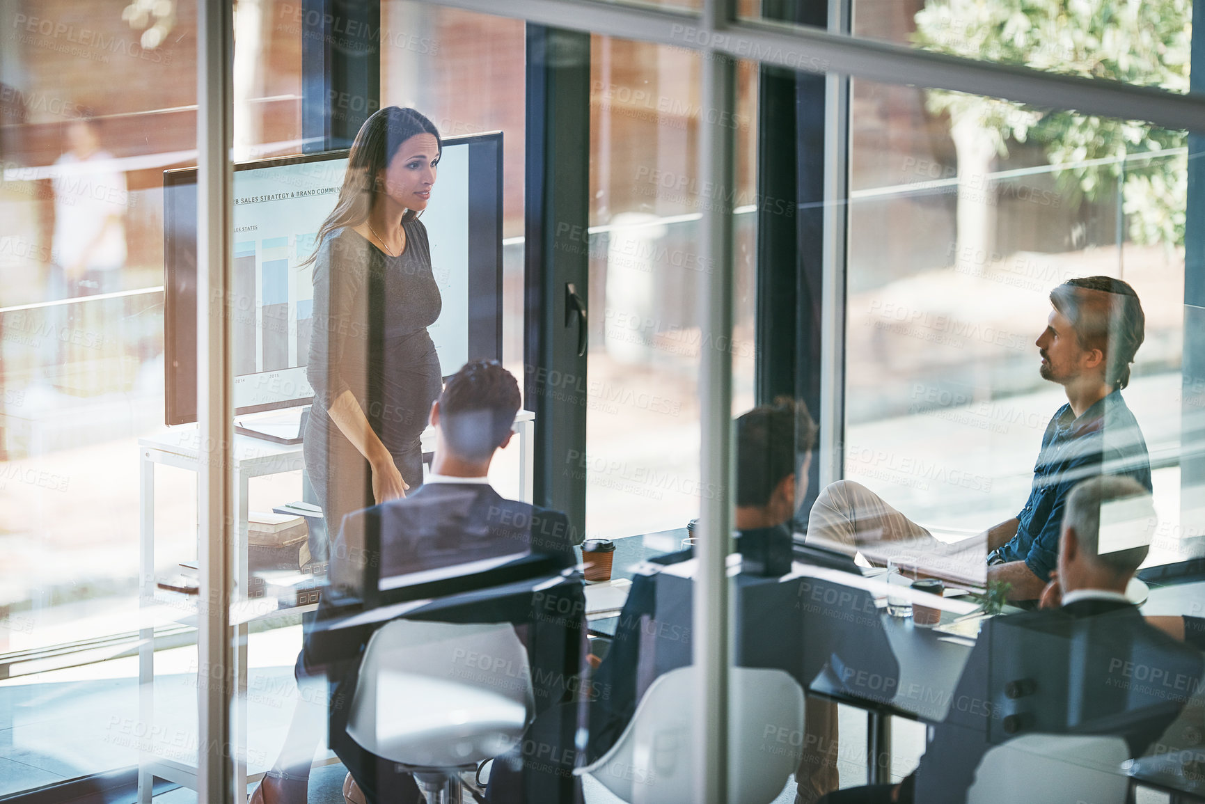 Buy stock photo Pregnant woman, presentation and boardroom by team, talk or smile for feedback with project in office. Speaker, men and women with group at meeting for stats, review or charts for brand communication