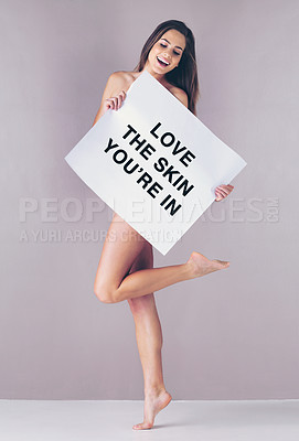 Buy stock photo Woman, smile and naked with poster in studio for body positivity, empowerment or confident in skin. Happy, text information and person with paper on pink background for self love, pride or acceptance