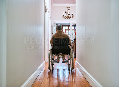 Buy stock photo Rearview shot of a senior woman sitting in her wheelchair at home