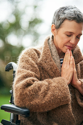 Buy stock photo Senior woman in wheelchair, prayer outdoor with worship and God with peace, religion with gratitude and faith. Spiritual female person with disability in nature, praying for guidance while in garden