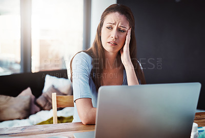 Buy stock photo Home office, remote work and woman with stress for a deadline freelance project with a laptop. Burnout, tired and female freelancer with fatigue doing research at her desk or workspace at her house.