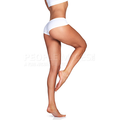 Buy stock photo Skincare, legs and woman on mockup in studio for grooming, smooth and soft against a white background. Body care, leg and girl model relax in underwear for skin, glow or luxury beauty while isolated