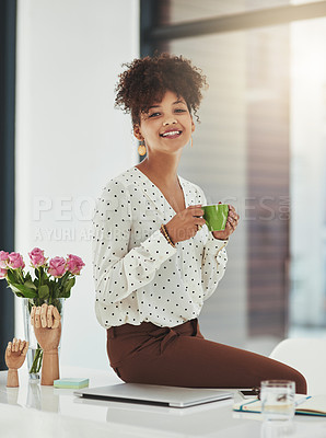 Buy stock photo Shot of a beautiful young businesswoman working in her office 