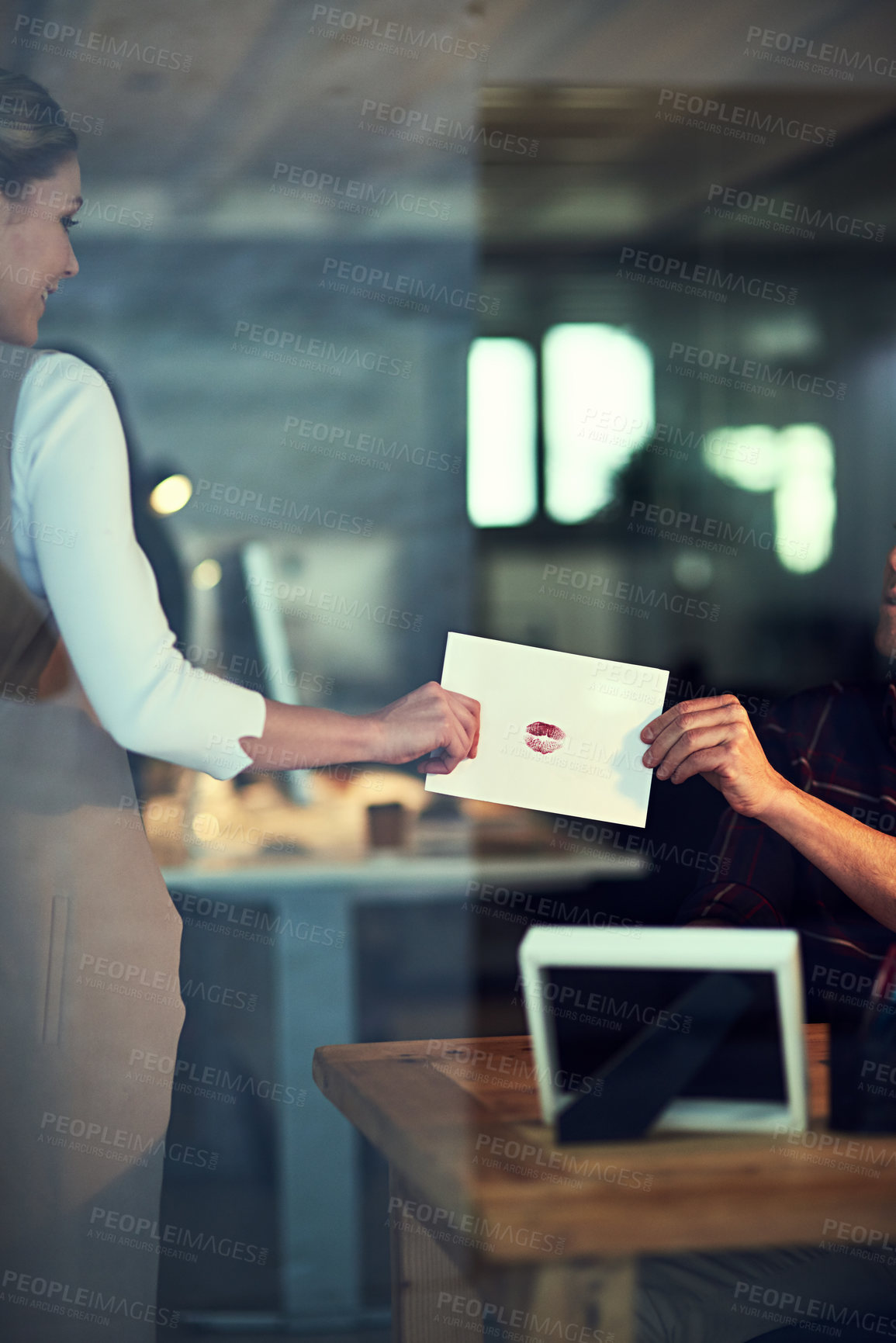 Buy stock photo Shot of a unrecognizable businessperson excepting a letter that's been given to her in the office