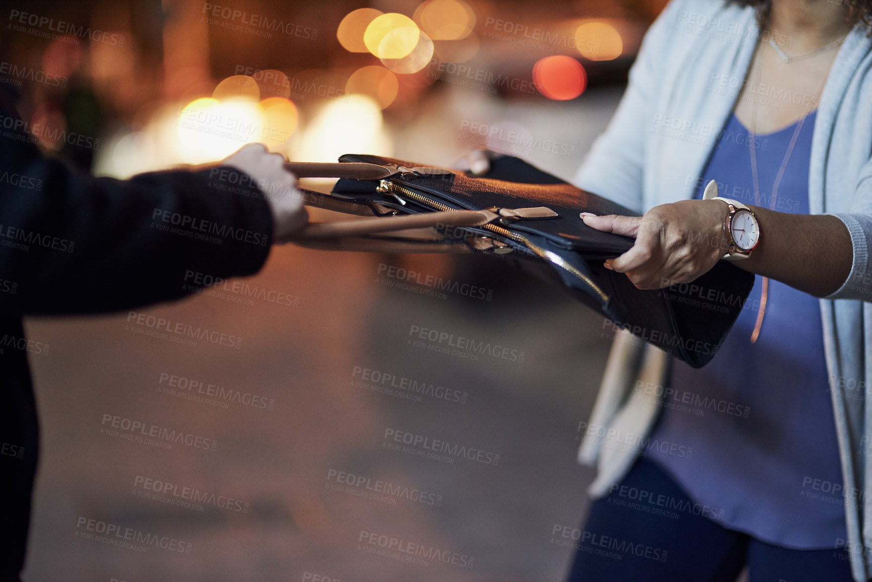 Buy stock photo Cropped shot of an unrecognizable woman having her bag stolen by a thief