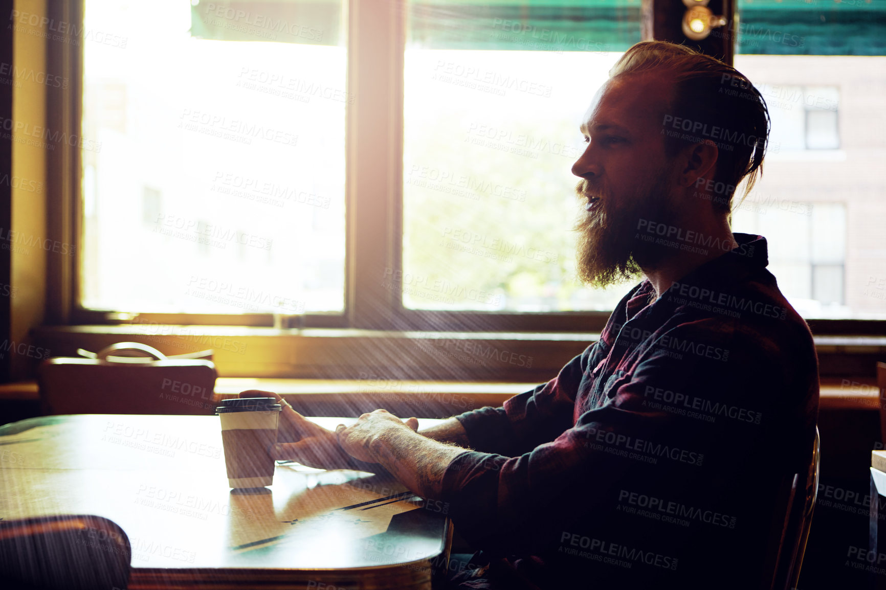 Buy stock photo Cropped shot of a male hipster in a coffee shop