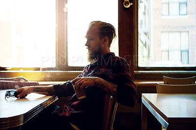 Buy stock photo Cropped shot of a male hipster in a coffee shop