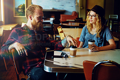 Buy stock photo Cropped shot of a hipster couple in a coffee shop