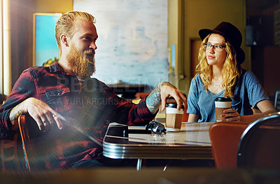 Buy stock photo Cropped shot of a hipster couple in a coffee shop