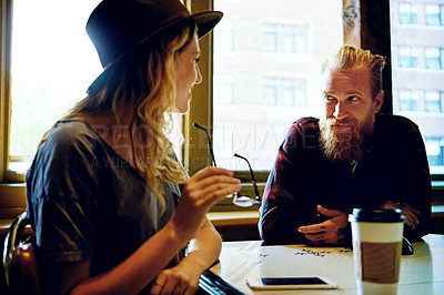 Buy stock photo Cropped shot of a hipster couple in a coffee shop