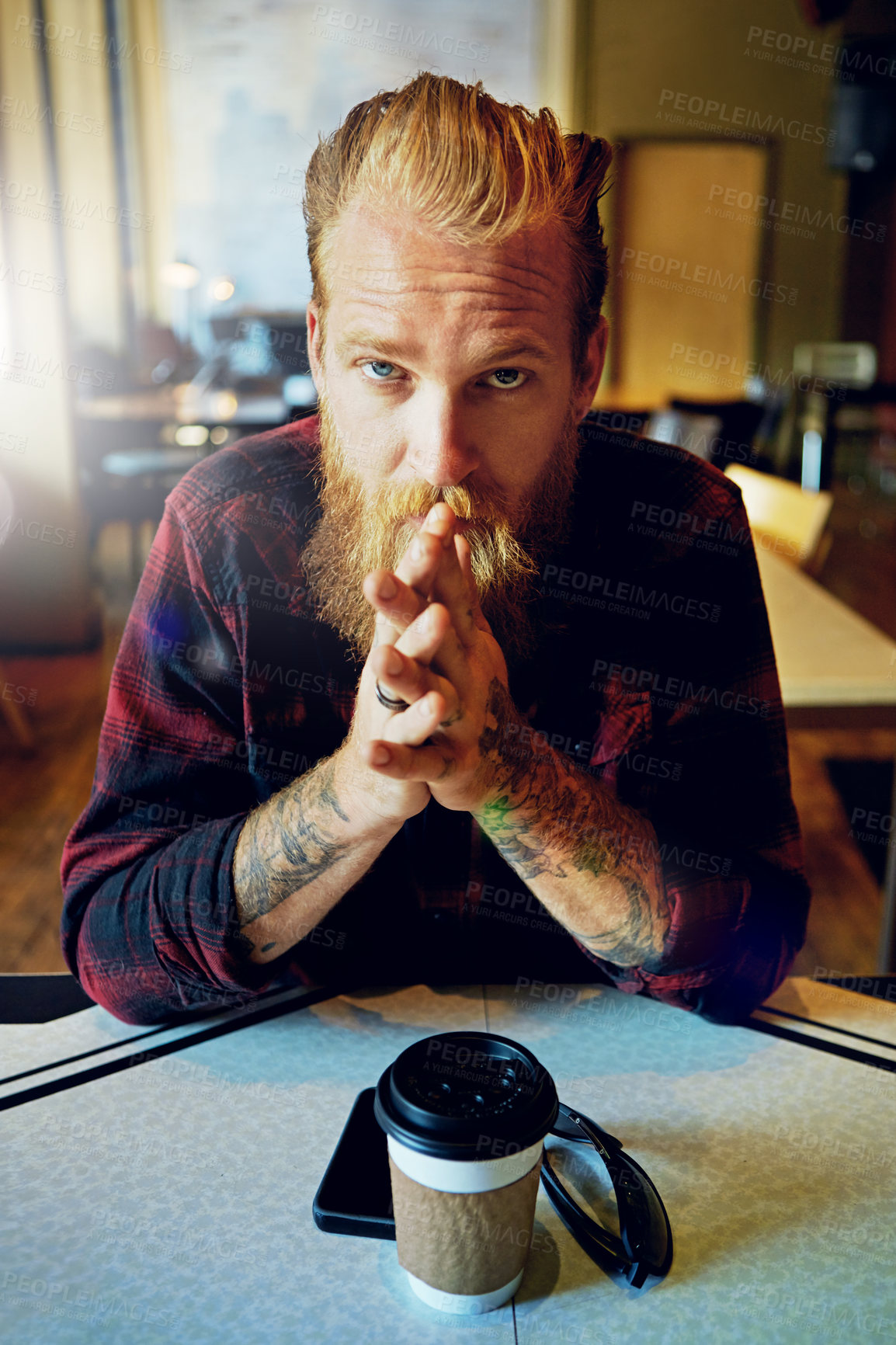 Buy stock photo Cropped shot of a male hipster in a coffee shop