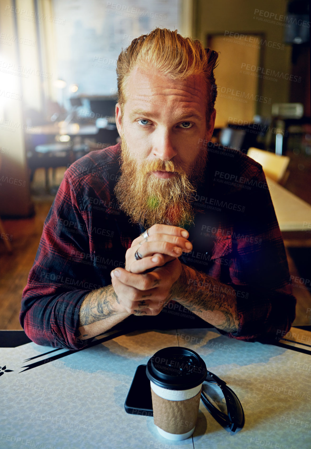 Buy stock photo Cropped shot of a male hipster in a coffee shop