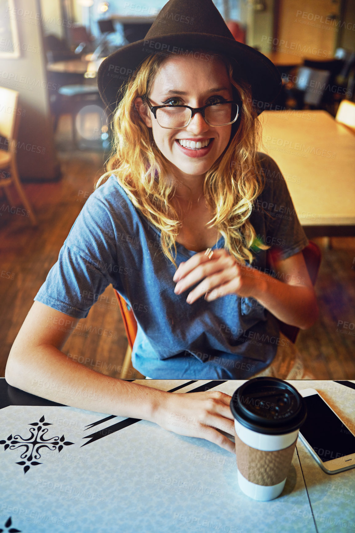 Buy stock photo Smile, portrait and woman with coffee in restaurant with relax on vacation or holiday with glasses. Happy, hipster and female customer with takeaway warm beverage at cafe on weekend trip with calm.