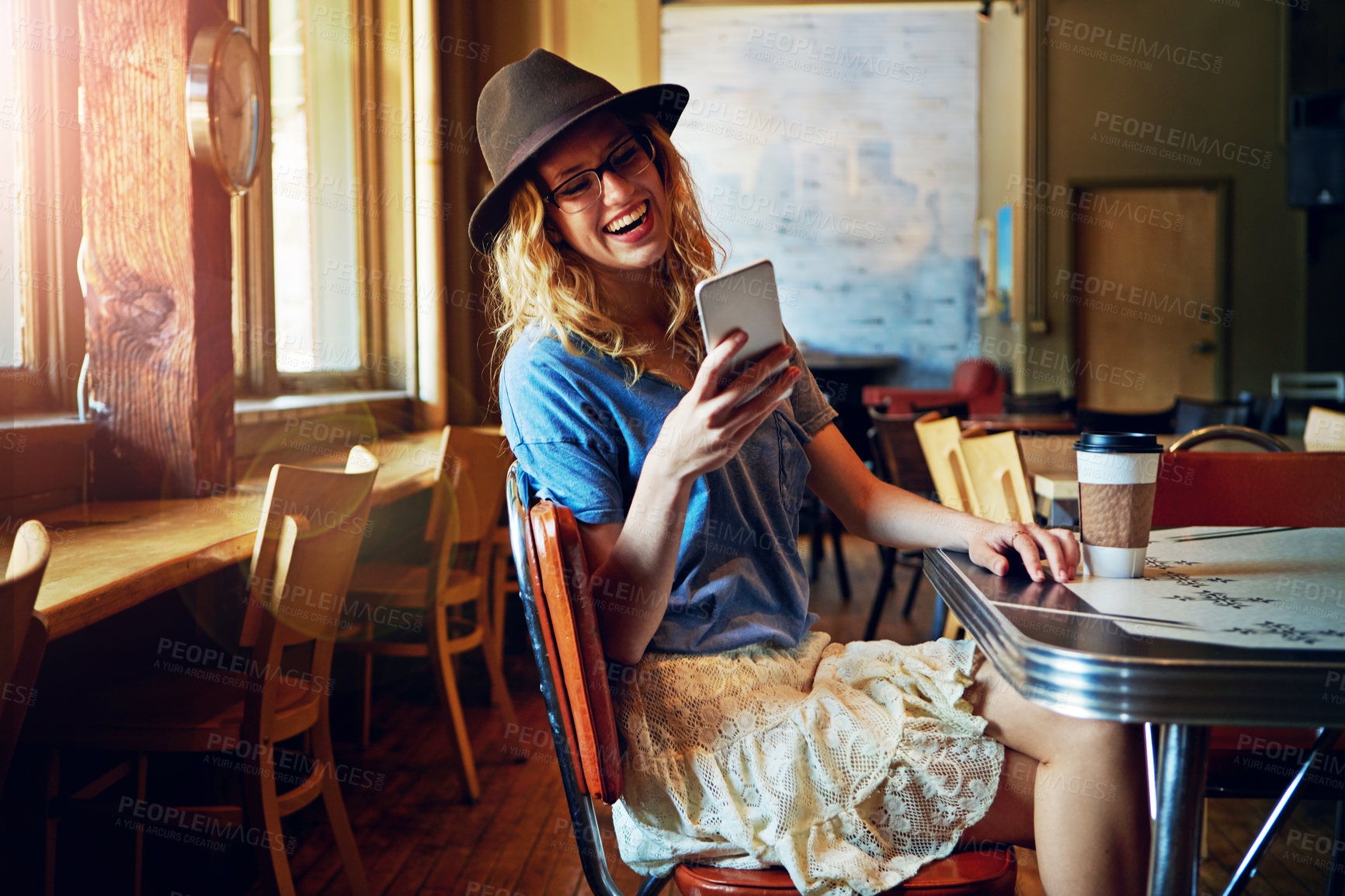 Buy stock photo Cropped shot of a female hipster in a coffee shop