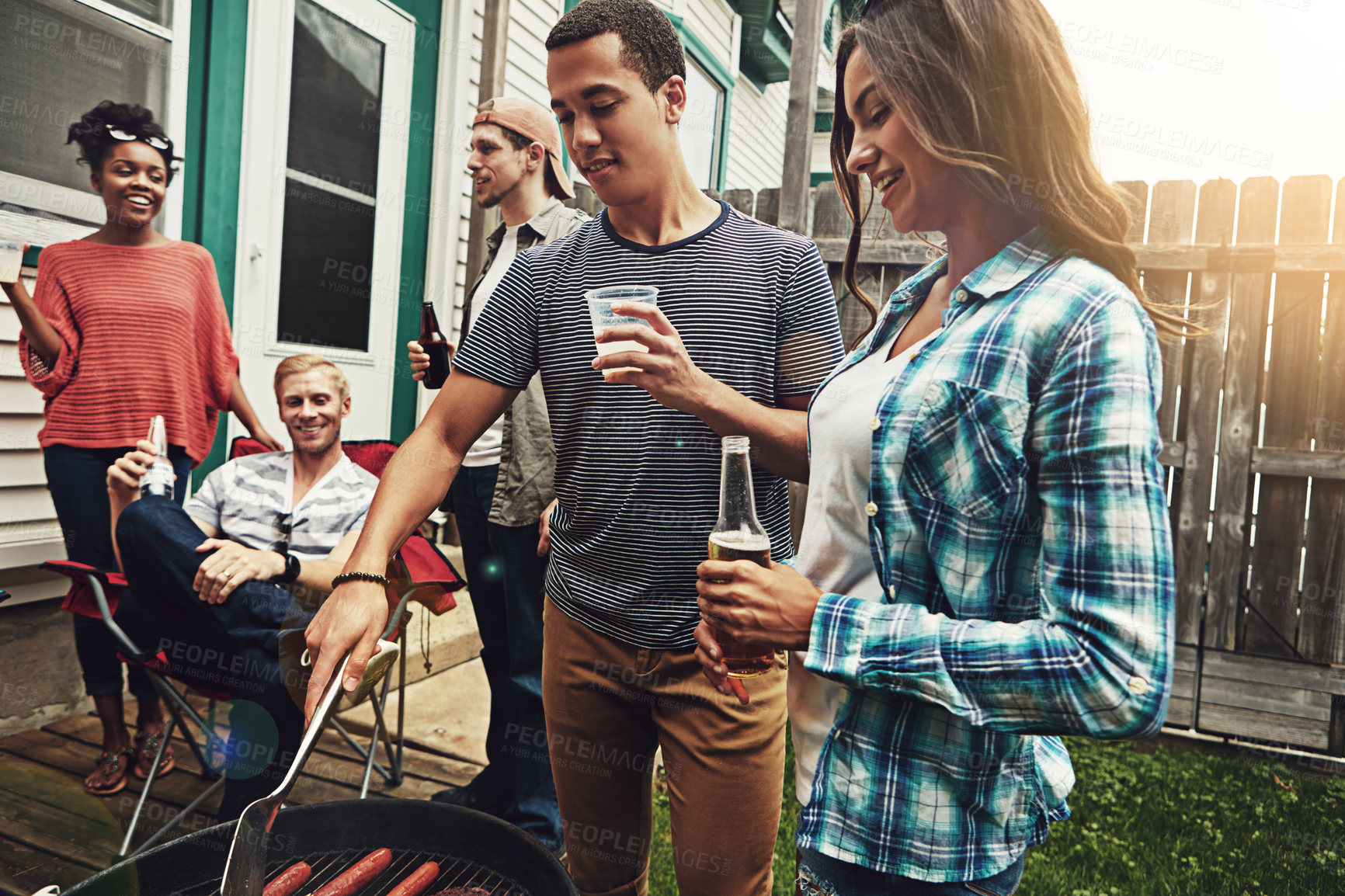 Buy stock photo Friends, group and beer in garden with bbq for social event, party and celebration with talking in home. People, drinking alcohol and food with relax, conversation and diversity at barbecue reunion