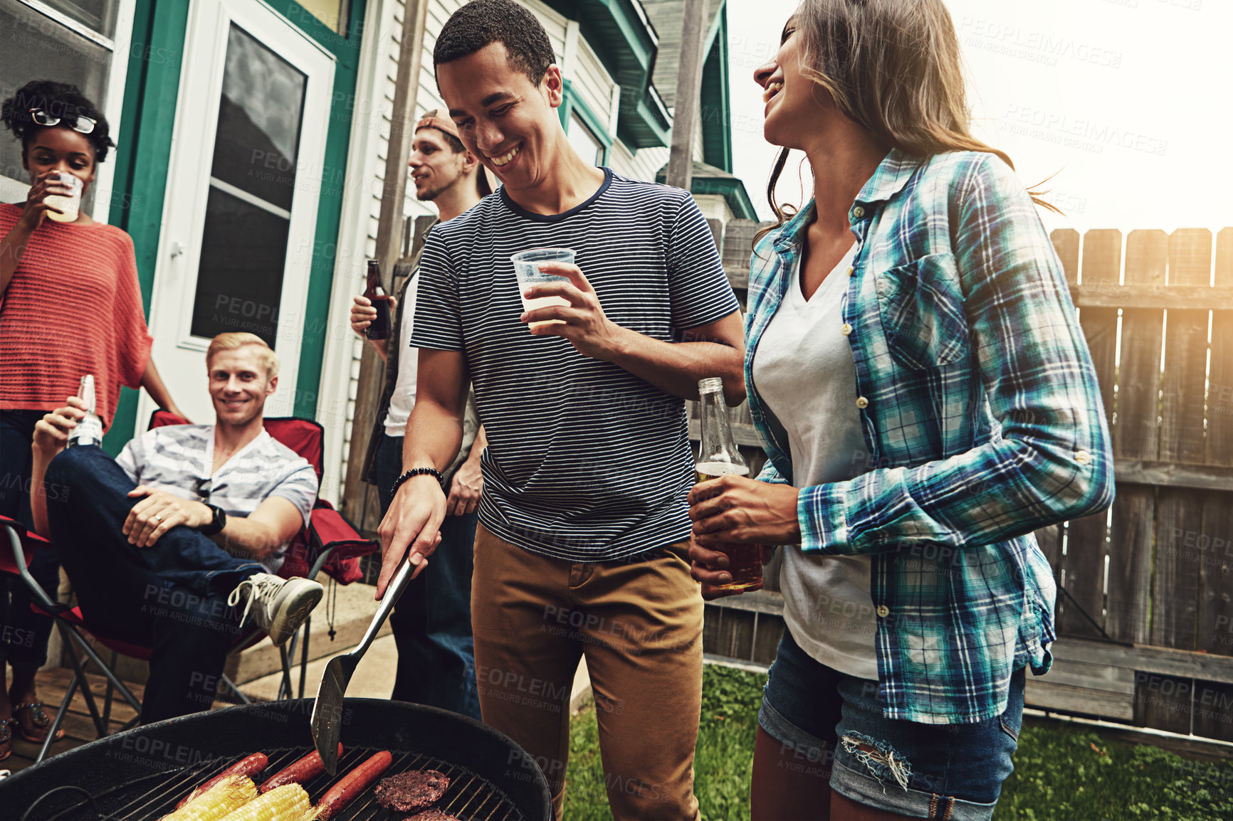 Buy stock photo Friends, people and alcohol in garden with bbq for social event, party and celebration with laughing for joke. Group, drinking beer and food with relax, funny conversation and diversity at reunion