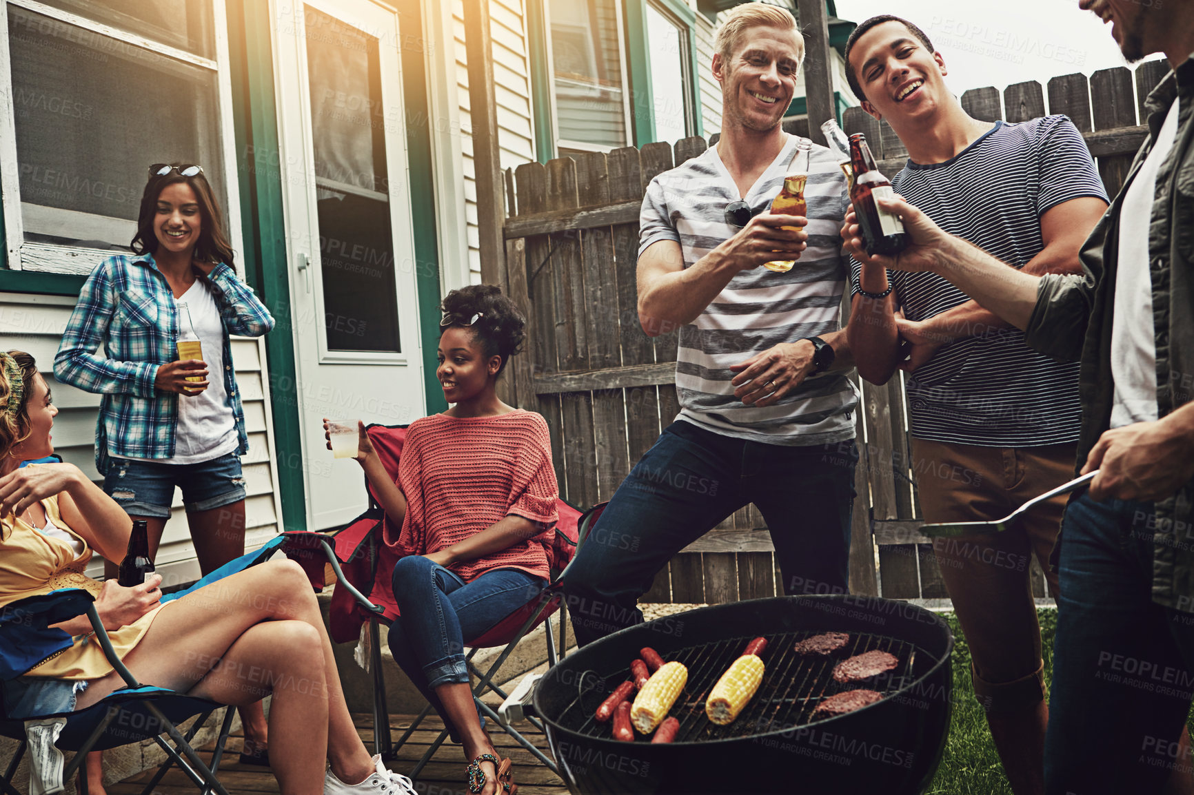 Buy stock photo Friends, people and cheers in backyard with bbq for social event, party and celebration with beer in garden. Group, drinking alcohol and food with relax, conversation or diversity at barbecue reunion