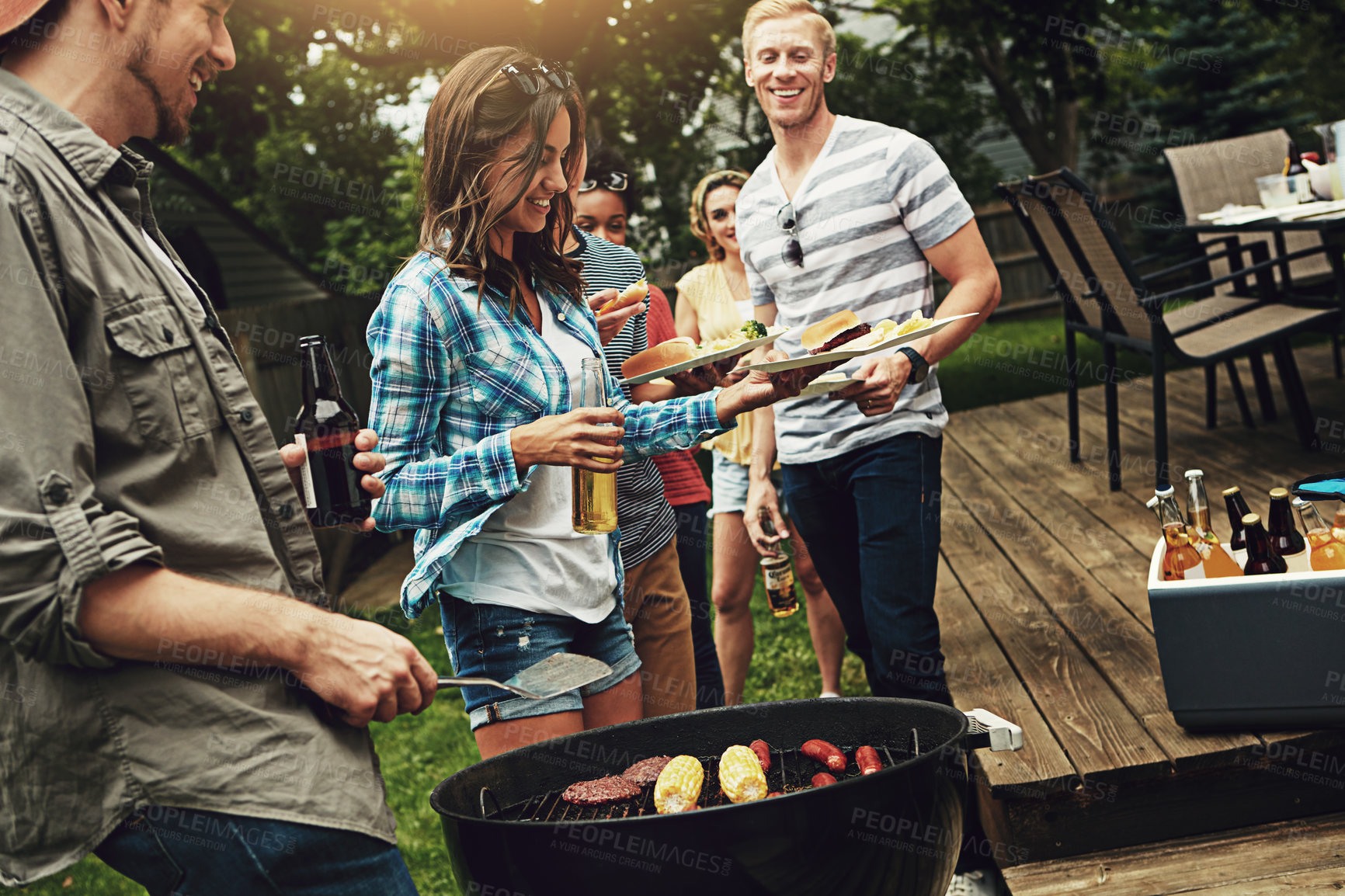 Buy stock photo People, barbecue and serving with plate in backyard with diversity cooking and choice with meat on fire. Friends, men and women with beer, happy and relax with food by bbq grill on holiday in Florida