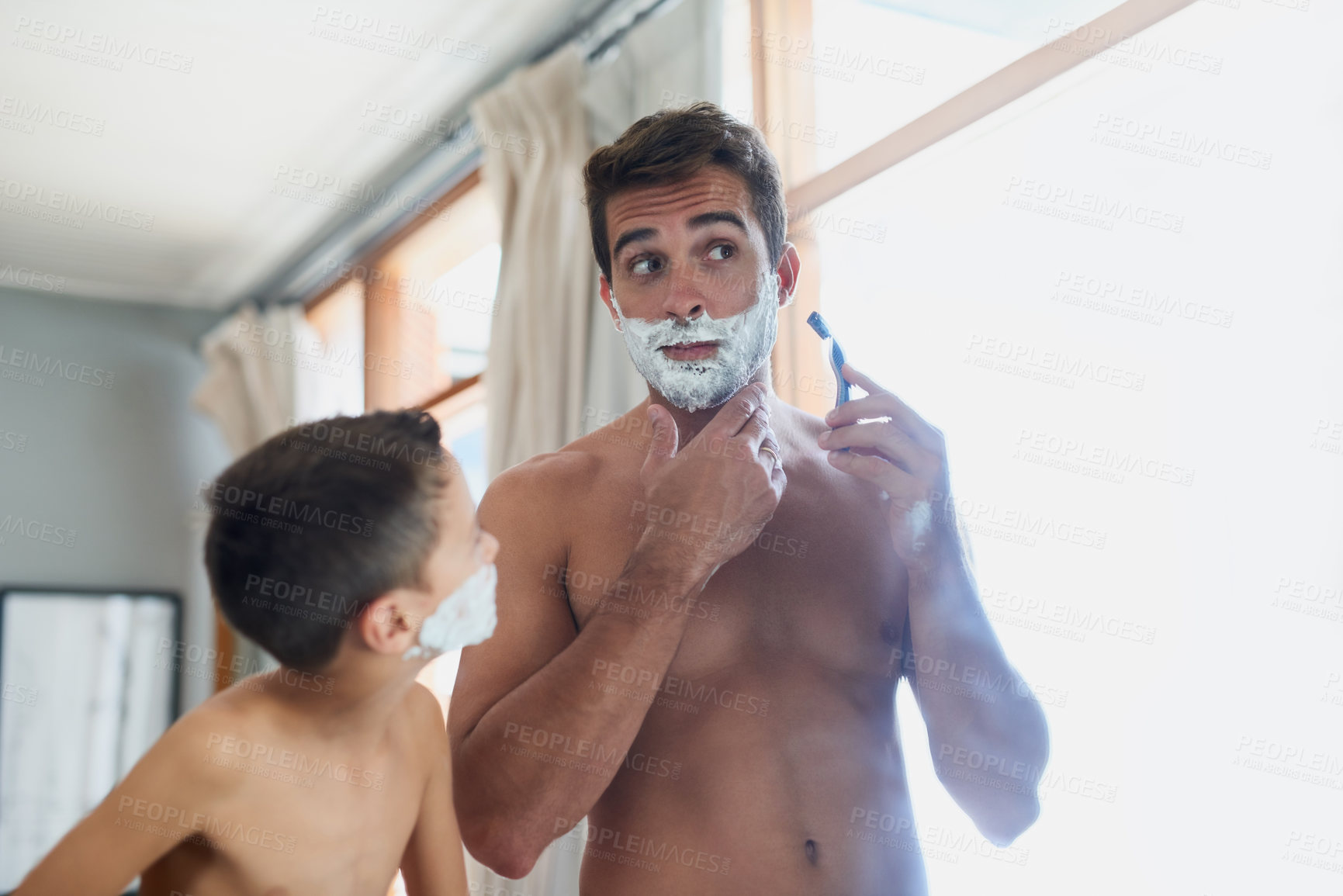 Buy stock photo Bathroom, bonding and father shaving with kid for hygiene, grooming and health routine. Teaching, child development and boy learning razor facial epilation treatment with dad for skincare at home.