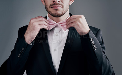 Buy stock photo Studio shot of a well-dressed man posing against a gray background