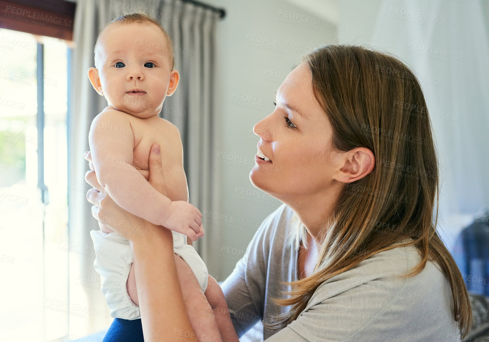 Buy stock photo Cute, love or security with mother and baby in living room of home together for bonding or caring. Development, family or growth with happy single parent woman and child in apartment for safety