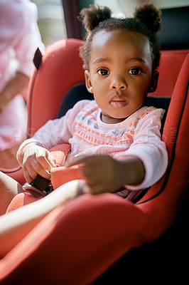 Buy stock photo Travel, safety and portrait of black child in car seat for road trip, protection and weekend adventure. Transport, harness and little girl in booster for holiday drive, journey and comfort in vehicle