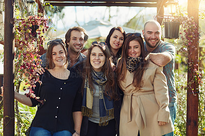 Buy stock photo Shot of a group of friends spending time together