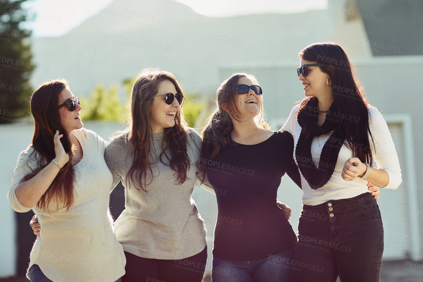 Buy stock photo Happy, group of woman and hug in social for celebration, support or care on vacation or holiday. People, bonding and outdoor on team building trip, travel or tourism in together for relax in backyard