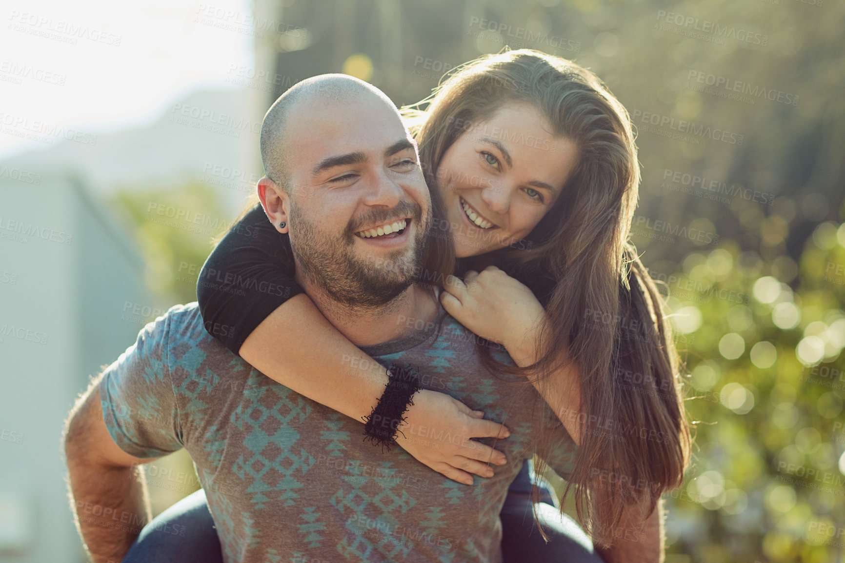 Buy stock photo Cropped shot of a young couple outdoors