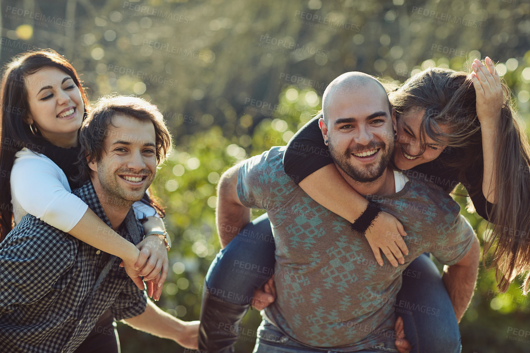 Buy stock photo Cropped shot of two happy couples out on a double date