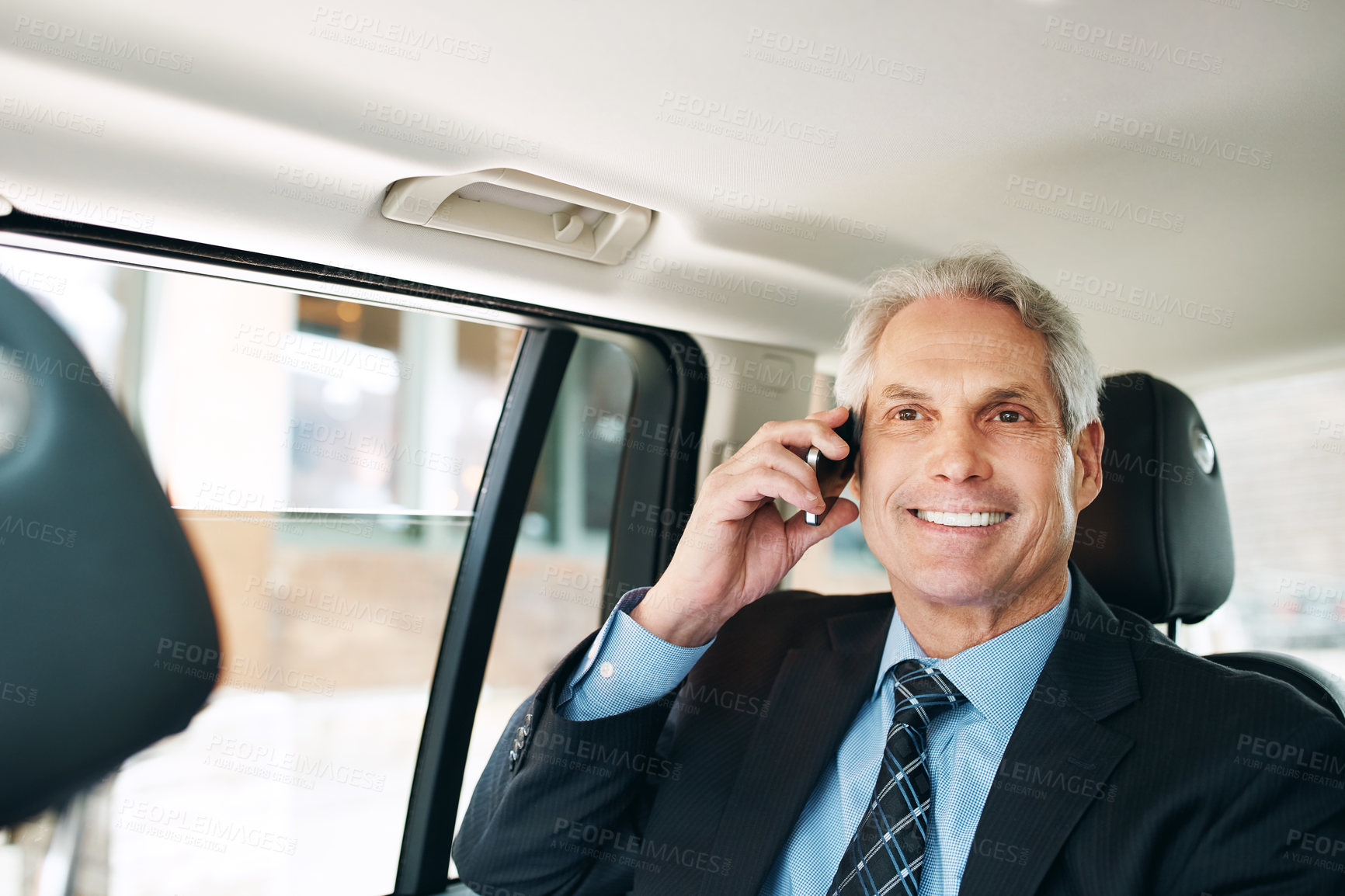 Buy stock photo Happy man, mature and phone call in taxi for transport, schedule meeting, communication in backseat. Talking, vehicle and employee with mobile for conversation, commute or travel on business trip