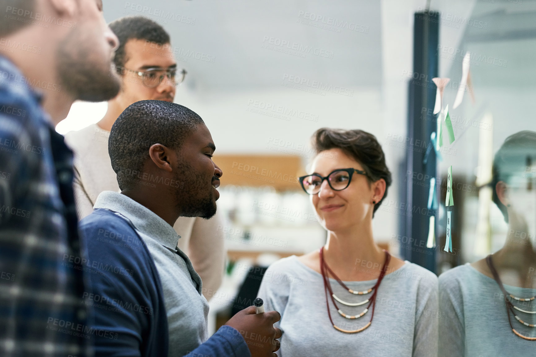 Buy stock photo Office, people and happy on glass wall for strategy with teamwork, collaboration and planning. Brainstorming, ideas and vision or mission for project at workplace with sticky notes for solution